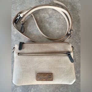 Wrangler small crossbody wallet purse in a tan/khaki color made of vegan leather